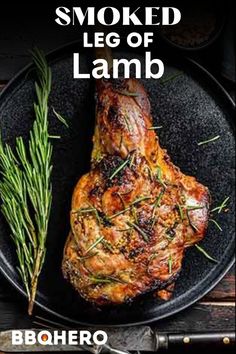 grilled lamb chops on a black plate with rosemary garnish and brown rice