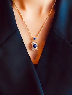 Metal: 18k gold vermeil Gemstone-  Natural Lapiz Lazuli, Natural clear Quartz Length of pendant : 26mm Width of pendant : 14mm weight: 7.4 g Free Gift- Brass Chain Length: 16" + 2" Closure: Spring clasp Elegant Cabochon Sapphire Jewelry, Elegant Sapphire Cabochon Jewelry, Elegant Blue Hallmarked Necklace, Luxury Royal Blue Jewelry, Elegant 14k Gold Locket Jewelry, Elegant Sapphire Jewel Necklace, Luxury Birthstone Jewelry For Formal Occasions, Formal Sapphire Cabochon Jewelry, Luxury Blue Locket Necklace