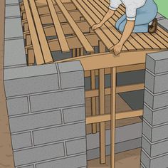 a man is working on the roof of a house that has been built with cinder blocks