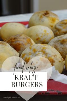 some food that is sitting on a red and white plate with the words food blog kraut burgers