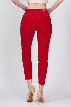 Vintage 80s/90s high waisted red corduroy pants with a tapered leg. Measurements and Condition: Fits like: Labeled size 5, fits modern women's extra small/petite Fabric: Cotton Brand: Bonjour Condition: Very good, with light general wear, and a 1.5" faint dark spot on the right seat (see photos) Waist: 24" Hips: 36" Rise: 10.25" Inseam: 26.75" See our FAQ section for more information on sizing and condition ratings. Red Corduroy Bottoms With Pockets, Red High-waist Corduroy Bottoms, Red Straight Leg Corduroy Bottoms, High Waist Red Corduroy Pants, Red Corduroy Jeans For Fall, Fall Red Corduroy Jeans, Red Corduroy Bottoms For Fall, Red Fitted Corduroy Bottoms, Fitted Red Corduroy Bottoms