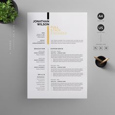 a clean and modern resume template with yellow accents on the cover, sitting next to a potted plant