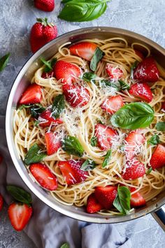 A pan of spaghetti topped with fresh strawberries, basil, and grated cheese on a gray textured surface. Strawberry Recipes Dinner, Strawberry Balsamic Chicken, Healthy Strawberry Recipes, Something Different For Dinner, Innovative Recipes, Strawberry Pizza, Strawberry Avocado Salad