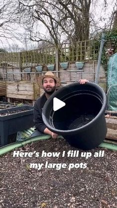 a man holding a large black pot in his hands with the words here's how i fill up all my large pots