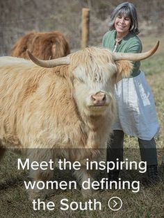 a woman standing next to a cow with horns on it's face and the words meet the inspiring women defying the south