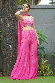 Shop for Richa Jaisinghani Label Pink Georgette Mirror Work Sharara Set for Women Online at Aza Fashions Pink Bandhani Dress, Pink Plazo Outfit, Hot Pink Indian Outfit, Sangeet Outfits For Women, Pink Mirror Work Lehenga, Sharara Look, Jaggo Outfit, Sangeet Theme, Mirror Work Sharara