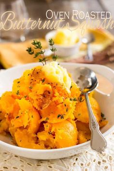 a white bowl filled with mashed potatoes on top of a table