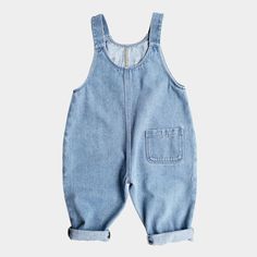 The Simple Folk "The Oversized Denim Dungaree" classic denim overalls  Square neckline Sleeveless Adjustable button straps Slip pockets at sides  Patch pocket at back  Oversized fit Organic cotton Made in Portugal Denim Blue Overalls With Adjustable Straps, Denim Blue Jumpsuit With Adjustable Straps, Medium Wash Cotton Shortalls With Adjustable Straps, Light Wash Cotton Overall Shortalls, Light Wash Cotton Shortalls, Cotton Denim Jumpsuit With Adjustable Straps In Medium Wash, Medium Wash Denim Jumpsuit With Adjustable Straps, Cotton Denim Jumpsuit With Adjustable Straps, Summer Denim Overalls With Adjustable Straps