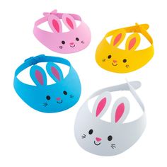 three different colored bunny ears and one has a cat's head on top of it