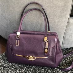 A Beautiful Purple Shade With Gold Hardware Coach Bag. In Excellent Condition, A Small Scratch In Leather As Shown In Picture Coach Purple Shoulder Bag With Adjustable Strap, Coach Purple Rectangular Shoulder Bag, Coach Purple Bag With Adjustable Strap, Coach Purple Shoulder Bag, Coach Purple Bags For On-the-go, Gold Hardware, Coach Bags, Satchel, Top Handle Bag