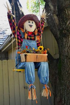 an image of a scarecrow on a swing