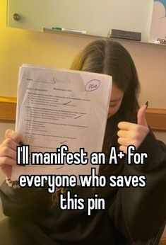 a girl reading a piece of paper with the caption i'll manfest an a for everyone who saves this pin