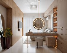 a living room filled with furniture and a round mirror