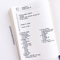 an open notebook with numbers and symbols on it