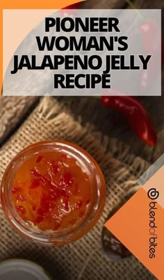 a jar filled with jelly sitting on top of a table