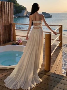 Olivia Mark - White Beach Maxi Dress with Open Back and Flowy Chiffon Train - Perfect for Coastal Vacations and Travel Photoshoots