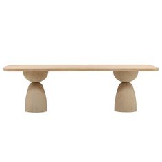 a wooden table with three legs and two small round bases on each end, against a white background