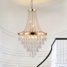 Beyond brightening your home, chandeliers make a statement in any room without occupying valuable floor space. This Modern luxury style chandelier is perfect for wide application, kitchen island, living room, dining room, enterway, hallway, foyer, corridor, stairway, bars, cafes, hotels, and restaurants, etc. GZMR Gold Crystal Chandeliers 10-Light Gold Modern/Contemporary Led, Dry rated Chandelier | GZ-1104949BK Home Chandeliers, Gold Ceiling Lamp, Kitchen Island Living Room, Island Living Room, Contemporary Crystal Chandelier, Hallway Foyer, Led Crystal Chandelier, Gold Pendant Lighting, Modern Ceiling Lamps