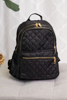 Stay stylish and carefree with our Abby Black Quilted Backpack Bag Tote Purse! Its unique quilted design adds a touch of flair while its versatile functionality as a backpack keeps you on the go. Don't sacrifice cuteness for convenience- enjoy each day with this must-have accessory! Quilted Design Lined Inside 28cm x 14cm x 32cm (top handle 9cm) Quilted Backpack, Cute Backpacks, Backpack Bag, Black Quilt, Tote Purse, Tote Backpack, Quilting Designs, Each Day, Backpack Bags