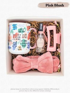 a pink bow tie, coffee mug, and other items in a box with the words pink blush on it