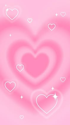 two hearts are in the middle of a pink background with white stars and sparkles