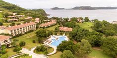 an aerial view of the resort and pool area