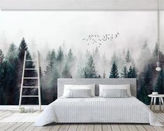 a bedroom with a large mural on the wall and a ladder in front of it