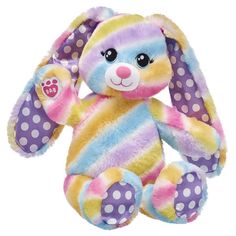 a colorful stuffed animal with polka dots on it