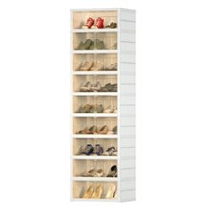 a white shoe rack filled with lots of shoes