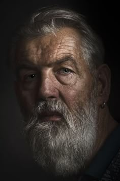 an older man with white hair and beard