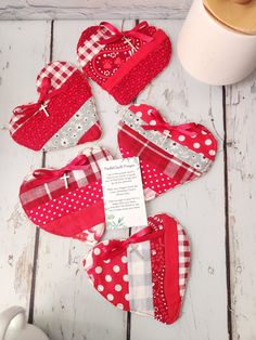 red and white heart shaped pieces on top of a table