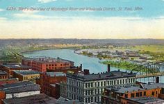 an old postcard shows the view of mississippi river and mitchell bridge