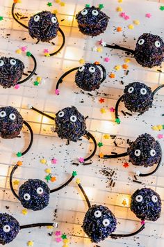 there are many black mouses made out of sprinkles