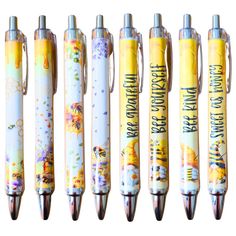 four pens with different designs on them