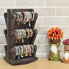 SKU: WD9866 Bracelet Display Two-Sided Rotating Wooden Jewelry Bracelet Display Stand with 6 Removable Holders The attractive and trendy wooden design makes it perfect to display on countertops, stores, tradeshows, craft shows and so on. TWO-SIDED ROTATING WITH 6 REMOVABLE BRACELET HOLDERS- This two-sided jewelry display stand is designed to maximize display area and showcase your collection from multiple angles. Enhancing visibility which allows for easy browsing by customers or yourself. The r Gem Makeup, Earring Displays, Bracelet Holders, Display Area, Craft Shows, Closet Accessories, Jewelry Display Stands, Bracelet Display, Necklace Display