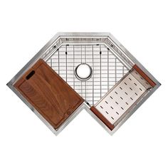 a stainless steel kitchen sink with wooden cutting board in the bottom and drainer on the side