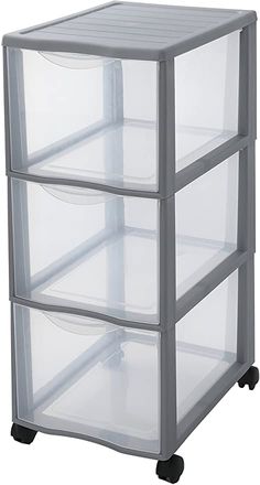 three drawers with wheels on each side and clear plastic bins on the bottom,