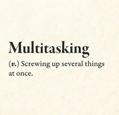 the words multitasking are written in black and white on a piece of paper