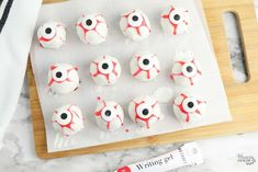 there are many cupcakes that have been decorated to look like eyeballs