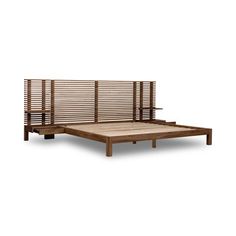 the bed frame is made from wood and has slats