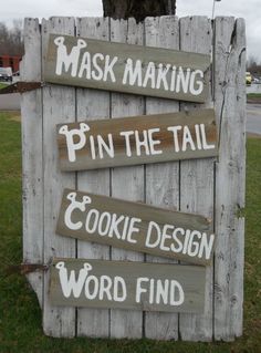 a wooden sign that says mask making pin the tail and cookie design word finder