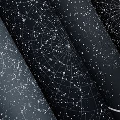 four black and white paper with stars in the night sky on one side, and an abstract pattern on the other