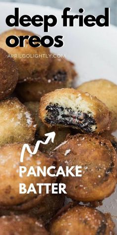 deep fried oreos on a plate with powdered sugar