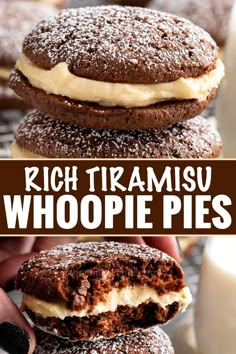 a close up of a person holding a chocolate cookie sandwich with cream frosting on top