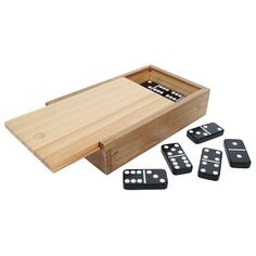 a wooden box with six dominos in it