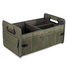 the large storage bin is open and has two compartments on each side, one with handles