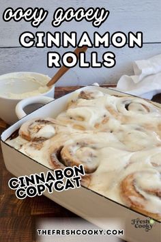 a casserole dish with cinnamon rolls in it and the title says, they gooey cinnamon rolls