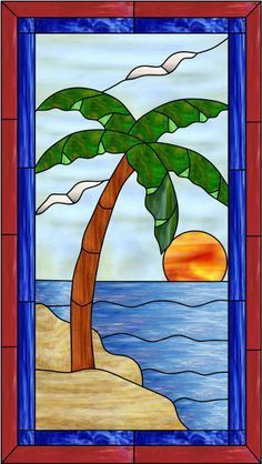 a stained glass window with a palm tree on the beach