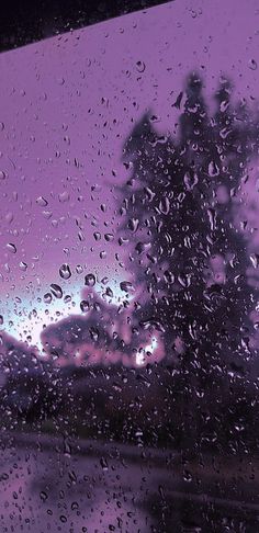 rain drops on the window as it is raining