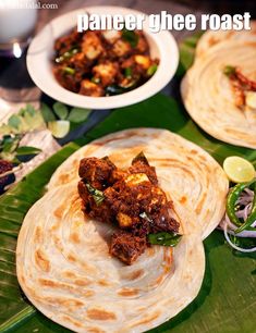 some food is laying out on a green plate